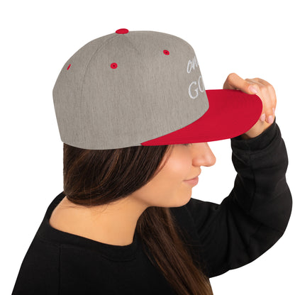 "Urban-inspired snapback hat with chic, modern aesthetics