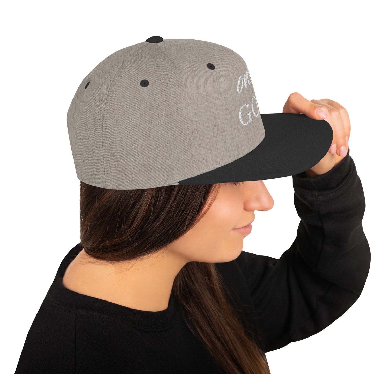 "Sleek snapback cap with a design inspired by mountain peaks."

